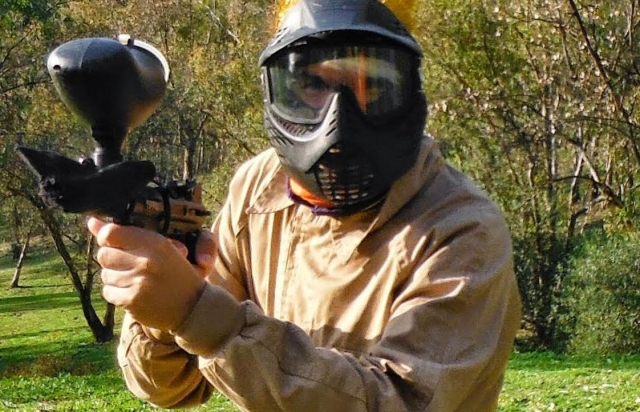  Paintball player pointing at us 